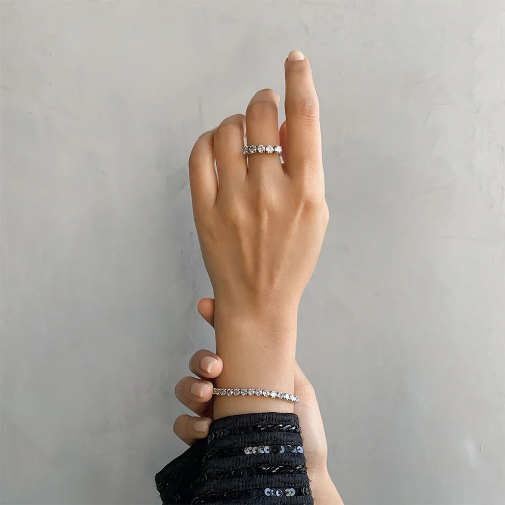 Elegant Sliver Bracelet With Sapphire White Gemstones.