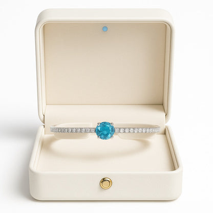 Elegant Silver Tennis Bracelet with Blue Crystal Centerpiece